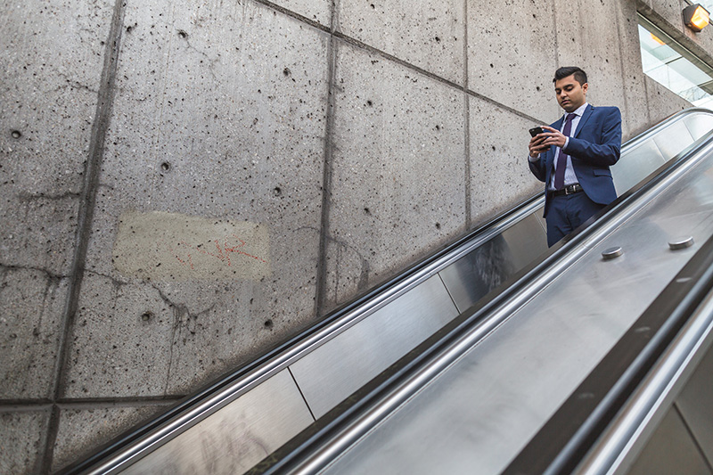 businessman-on-escalator_800.jpg